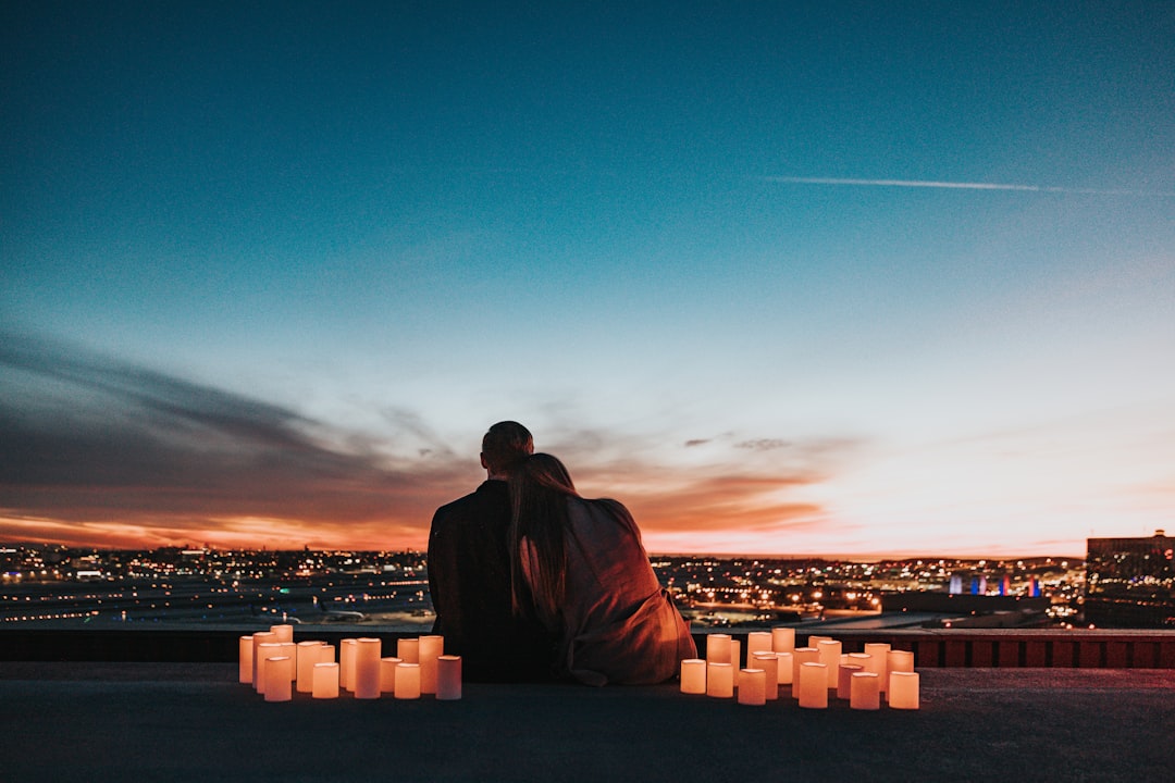 Happy newlywed couple enjoying an affordable romantic getaway