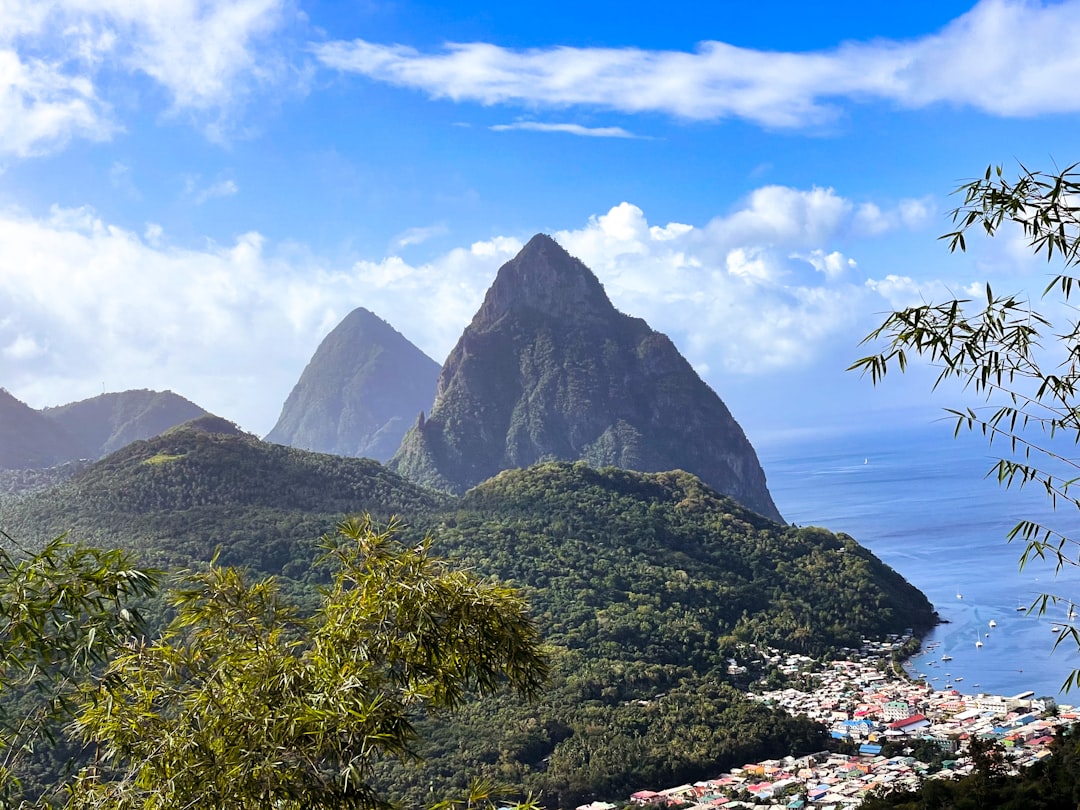 Dramatic Piton mountains rising from the sea in St Lucia