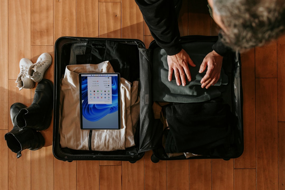 Couple excitedly packing luggage for their honeymoon trip