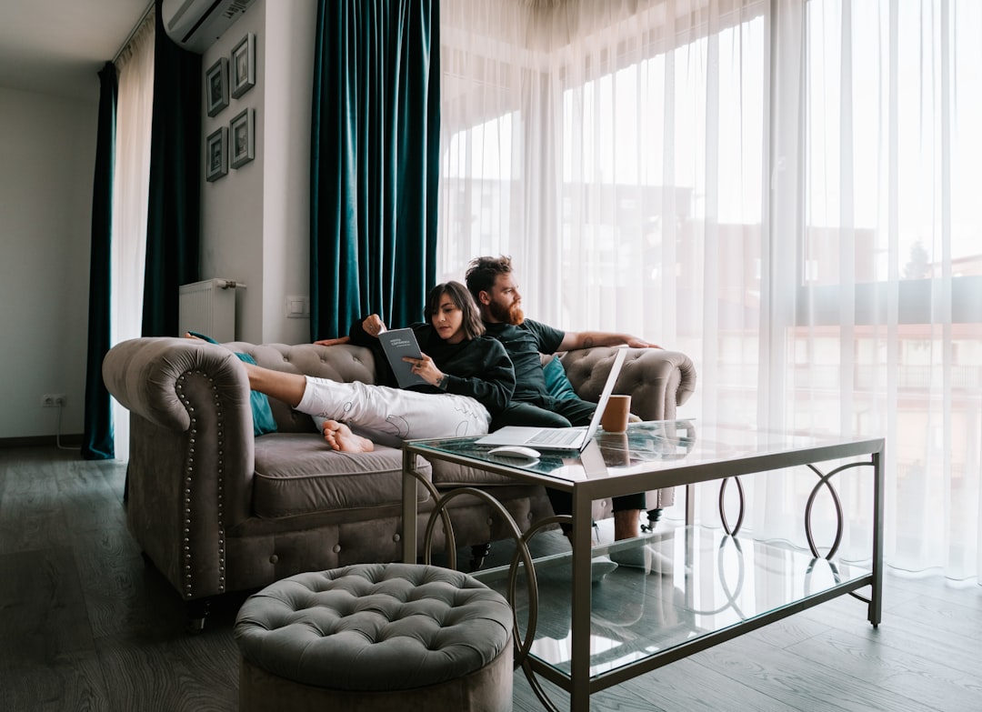 Couple planning their wedding on a laptop